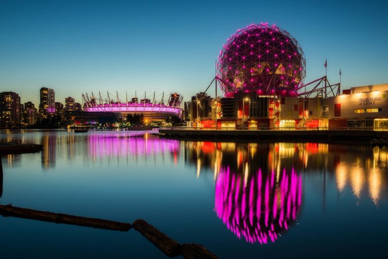 Science World and BC Place Place illuminated in pink