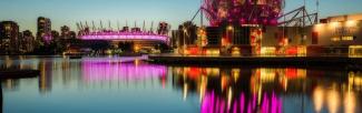Science World and BC Place Place illuminated in pink